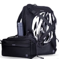 A black ZINGARO backpack shown with a matching black crossbody bag and a white-and-black bicycle helmet, photographed on a clean white background.